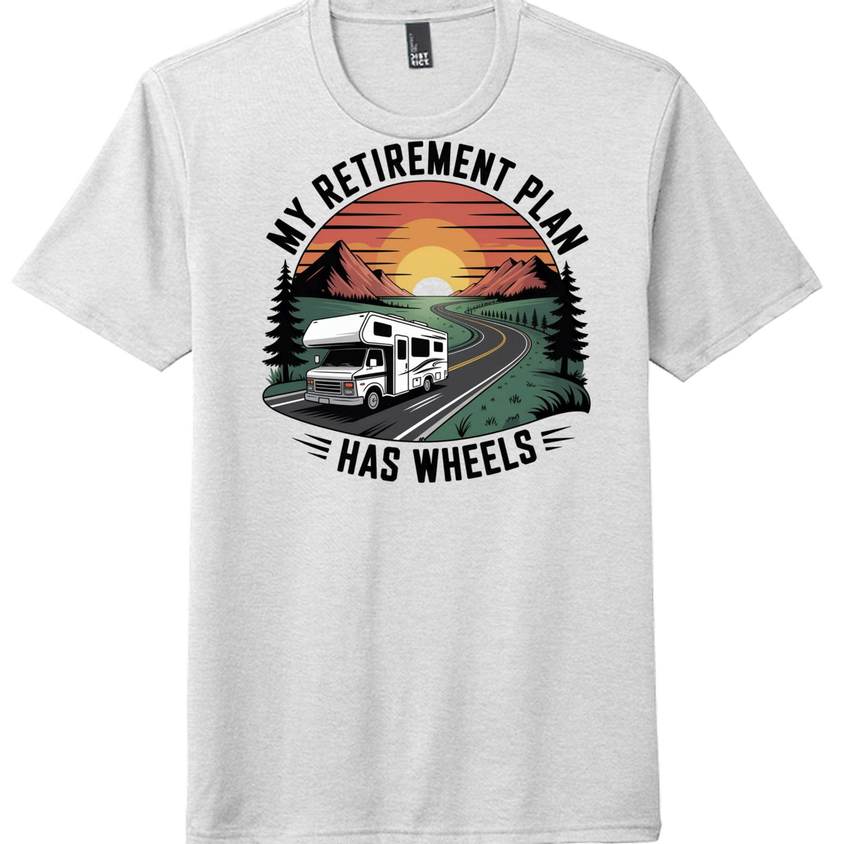 RV retirement shirt District DM130 featuring graphic of RV on road with sunset and text 'My Retirement Plan has Wheels'.
