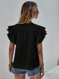Ruffle Cap Sleeve Blouse for Women shown from the back, highlighting its stylish design and ruffle sleeves.