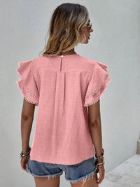 Ruffle Cap Sleeve Blouse for Women in pink color, showcasing delicate ruffle cap sleeves and stylish back design.