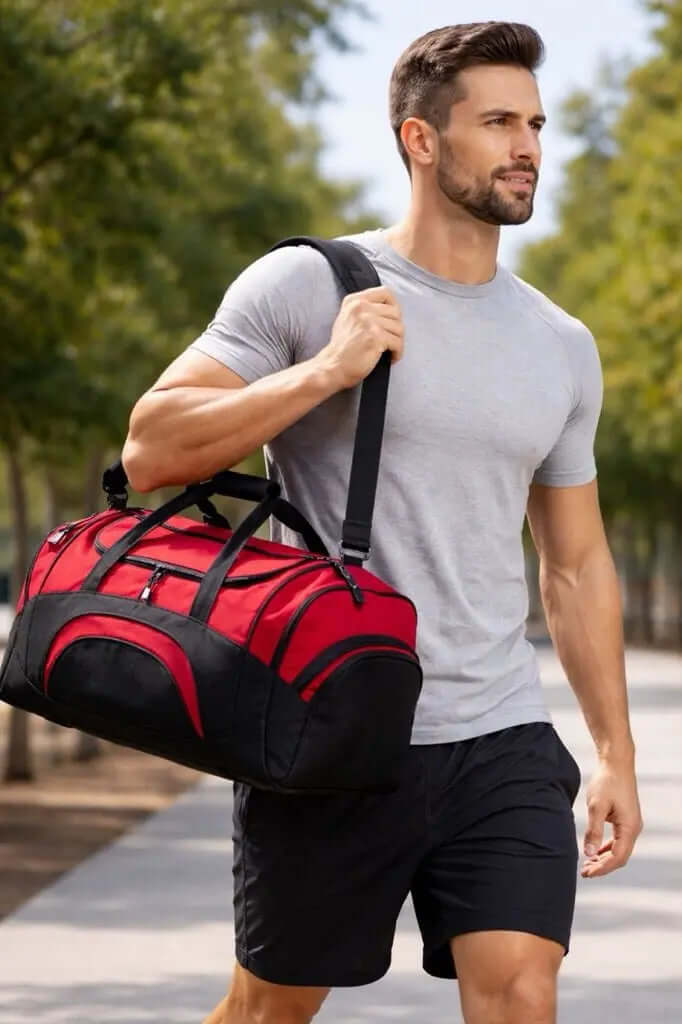 Durable sports gear bag in red and black color with multiple compartments for easy organization.
