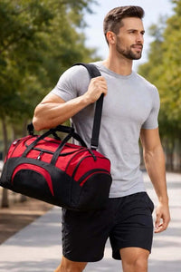 Durable sports gear bag in red and black color with multiple compartments for easy organization.