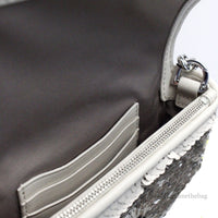Interior view of Marc Jacobs The Mini J Marc sequined shoulder bag showing card slots and zip pocket.