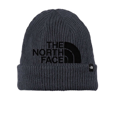 Black North Face Toboggan beanie with rib knit, adjustable cuff, fleece lining, and logo label
