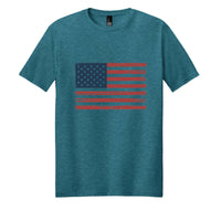 Vintage flag tee shirt in heathered teal with a distressed American flag design.