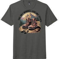 District DM130 Perfect Tri Tee in charcoal featuring artwork with hiking boots and the phrase 'Take only memories, leave only footprints.'