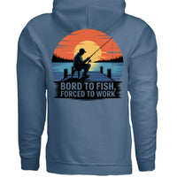 Born to Fish Hoodie featuring a fisherman on a dock with sunset design, showcasing love for fishing.