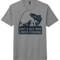 Fishing themed tri-blend t-shirt in grey frost with fishing graphic and text 'Just a guy who loves fishing'.