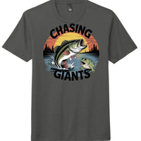 Chasing Giants graphic tee featuring a bass and frog design on a charcoal perfect tri tee.